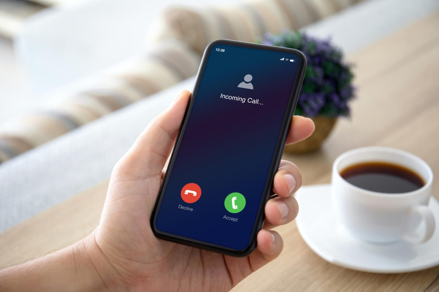 A phone receiving an incoming automated call delivering a voice message